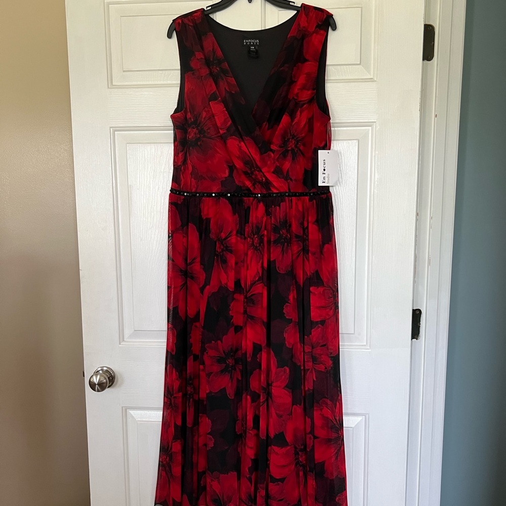 Black and red floral dress with black beaded waist details.